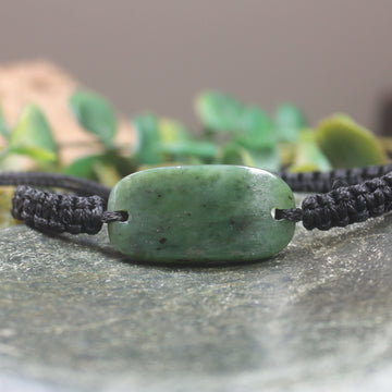 Adjustable cord bracelet with Hapopo Pounamu