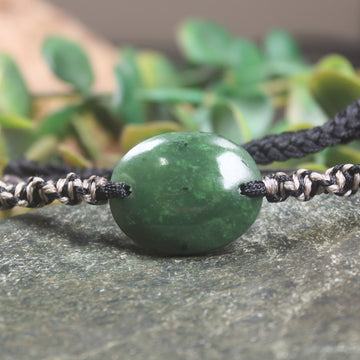 Adjustable cord bracelet with Hapopo Pounamu