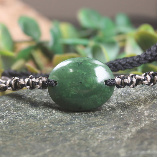 Adjustable cord bracelet with Hapopo Pounamu