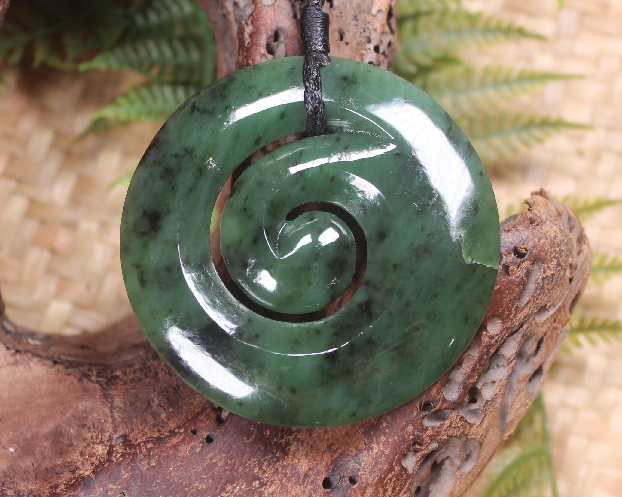 Koru carved from Rimu Pounamu - NZ Greenstone