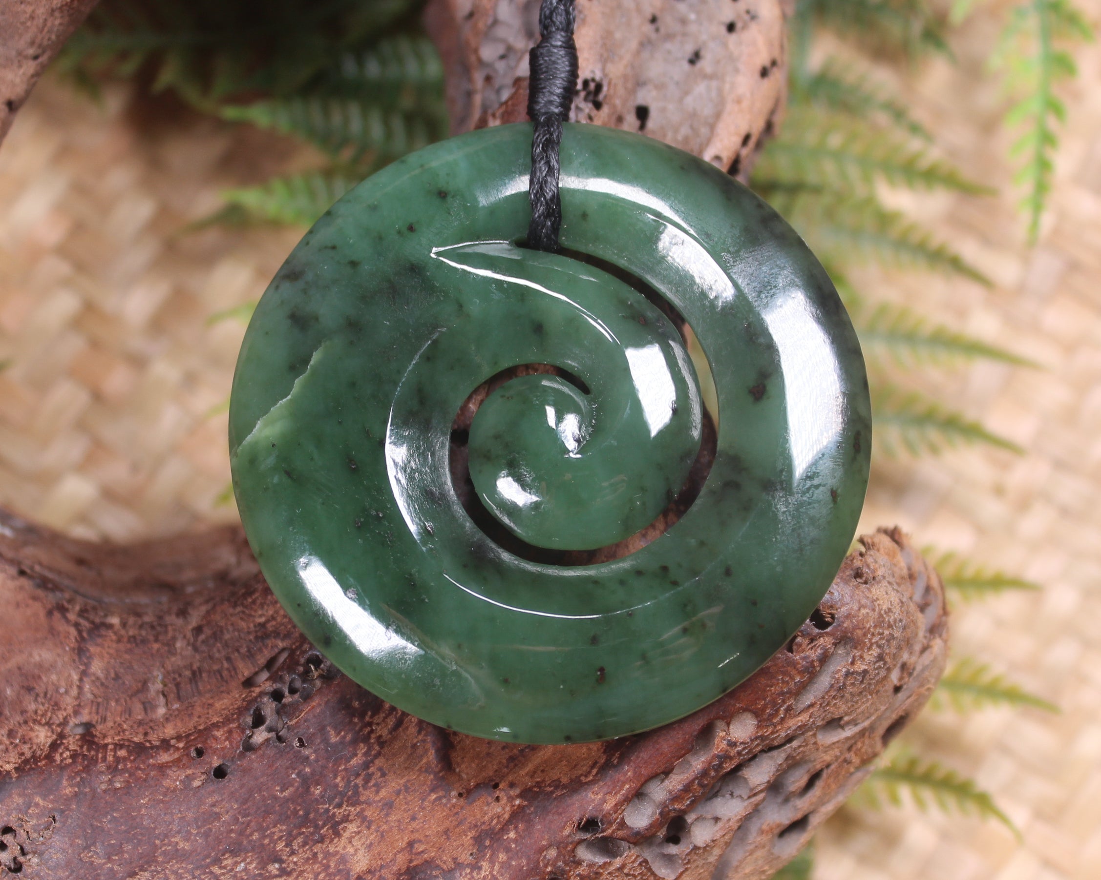 Koru carved from Rimu Pounamu - NZ Greenstone