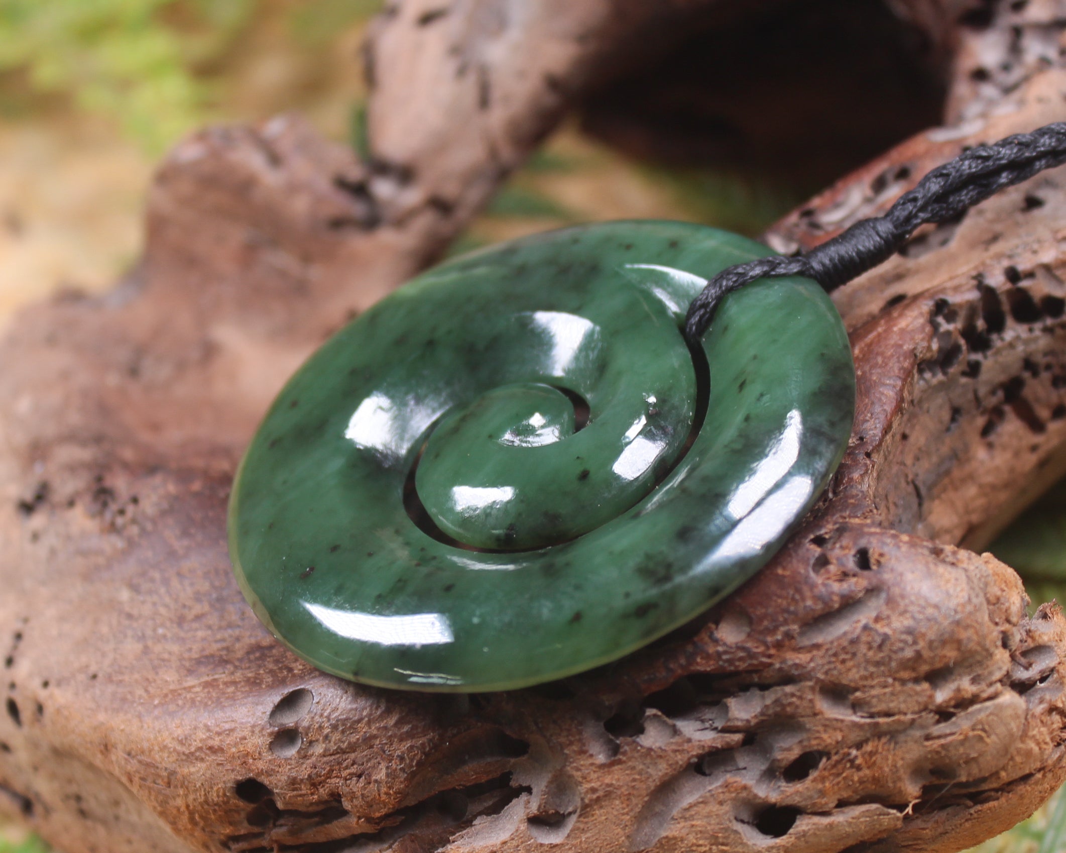 Koru carved from Rimu Pounamu - NZ Greenstone