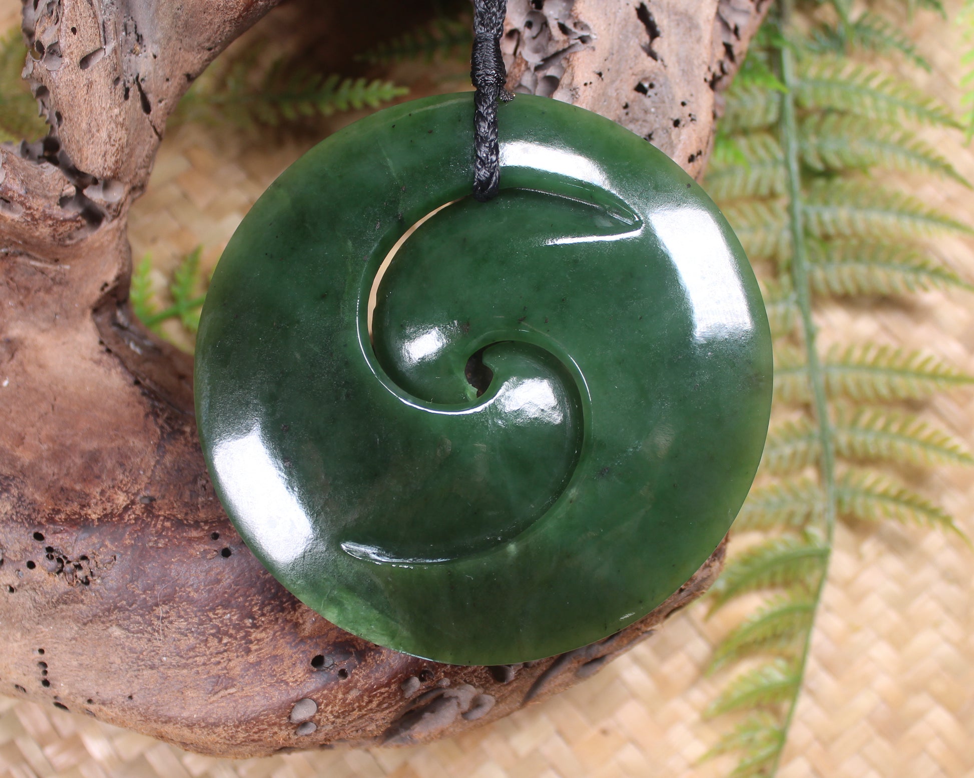 Koru pendant carved from Kawakawa Pounamu - NZ Greenstone
