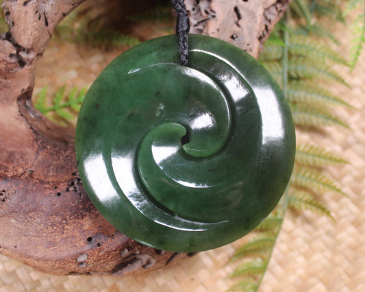Koru pendant carved from Kawakawa Pounamu - NZ Greenstone