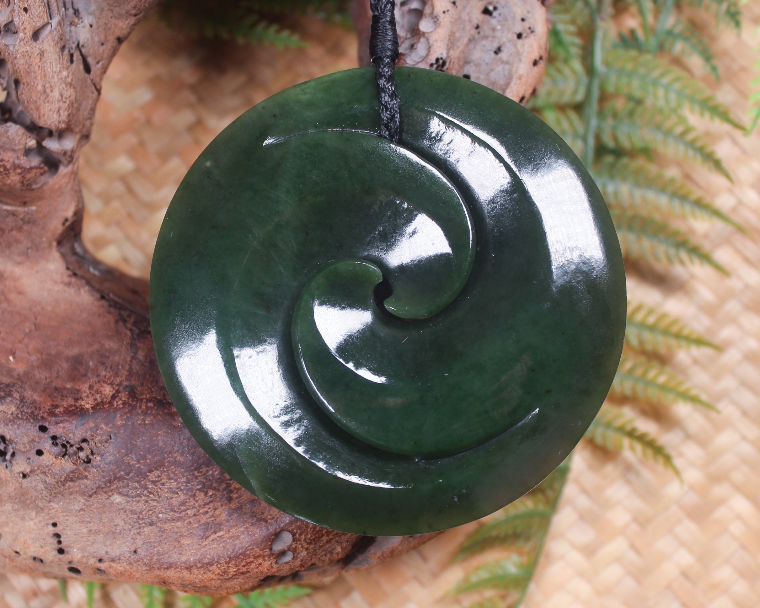 Koru pendant carved from Kawakawa Pounamu - NZ Greenstone