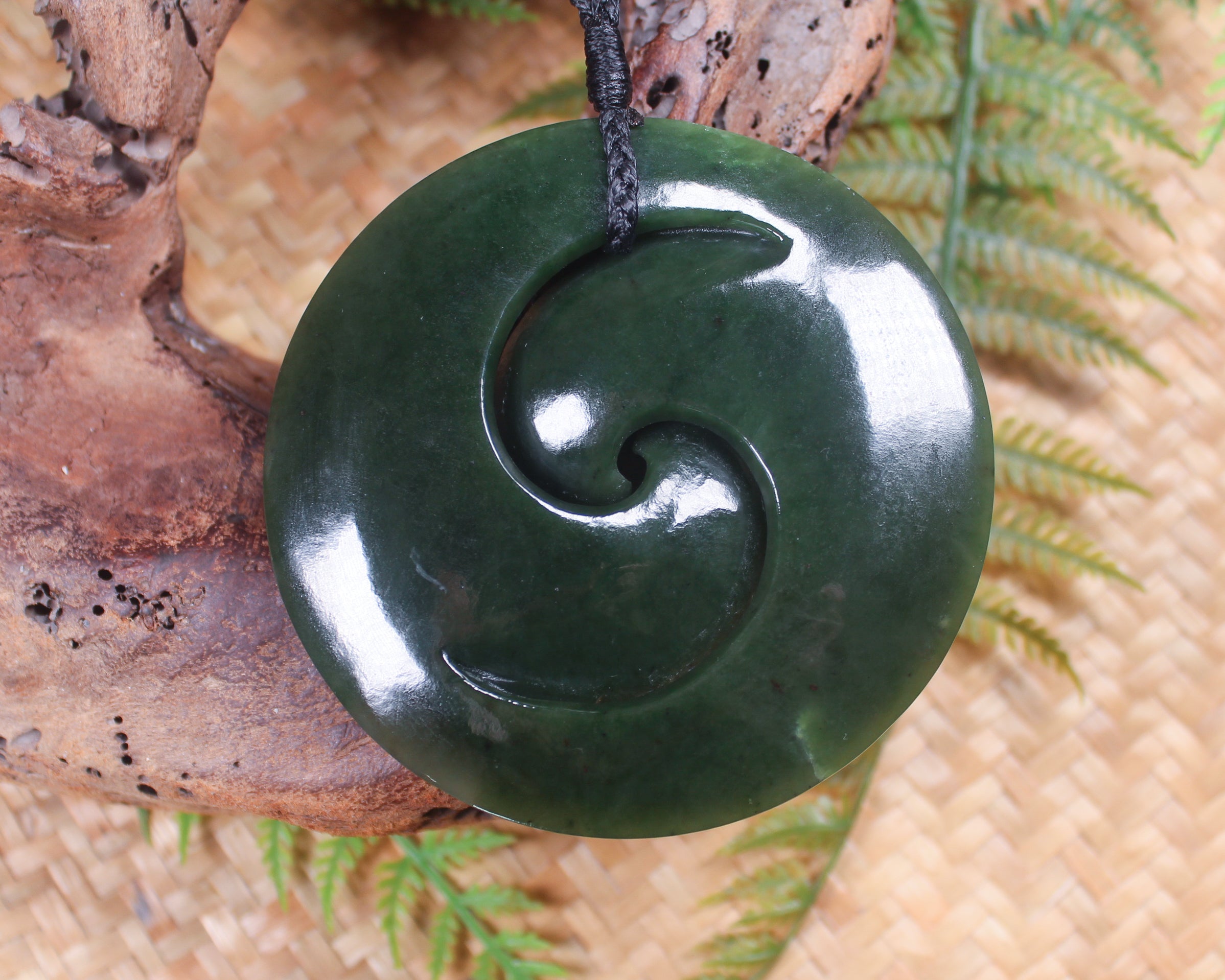 Koru pendant carved from Kawakawa Pounamu - NZ Greenstone