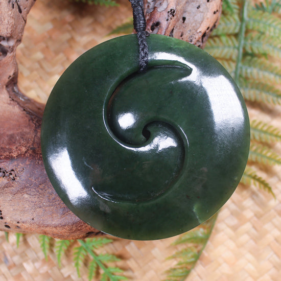 Koru pendant carved from Kawakawa Pounamu - NZ Greenstone