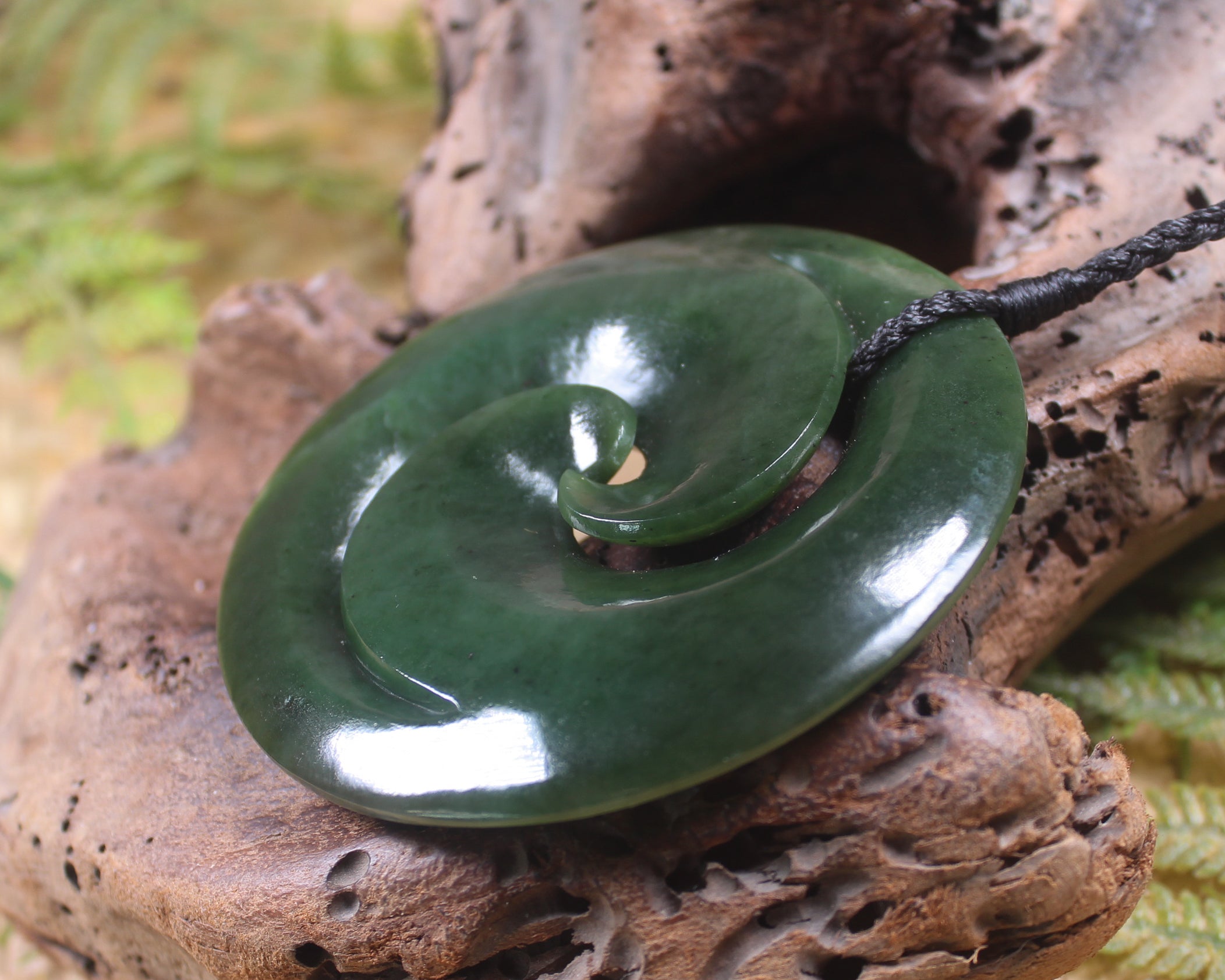 Koru pendant carved from Kawakawa Pounamu - NZ Greenstone