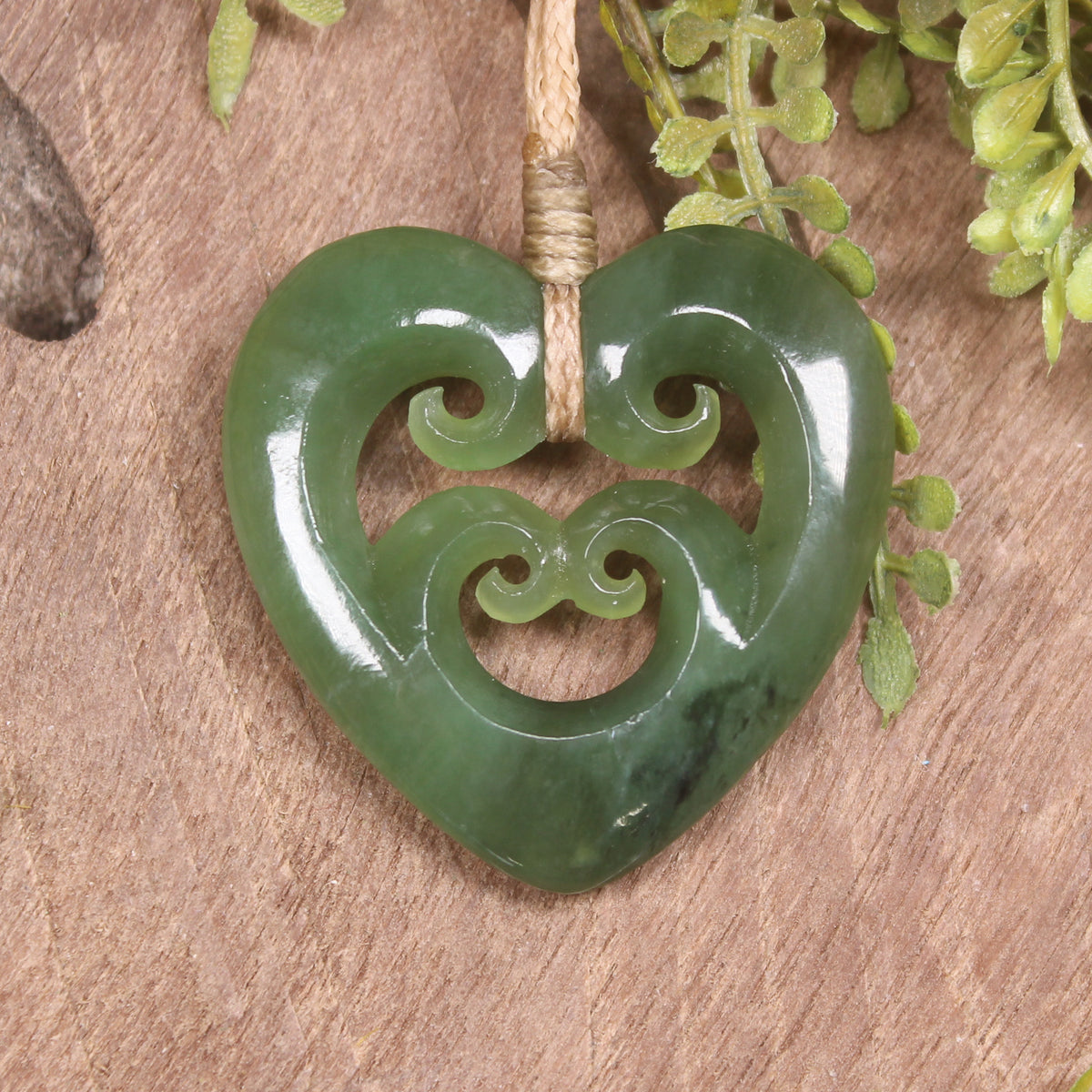 Heart with Koru carved from Hapopo Pounamu - NZ Greenstone