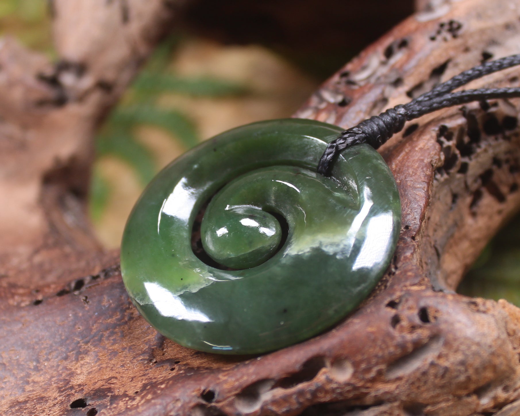 Koru carved from Rimu Pounamu - NZ Greenstone