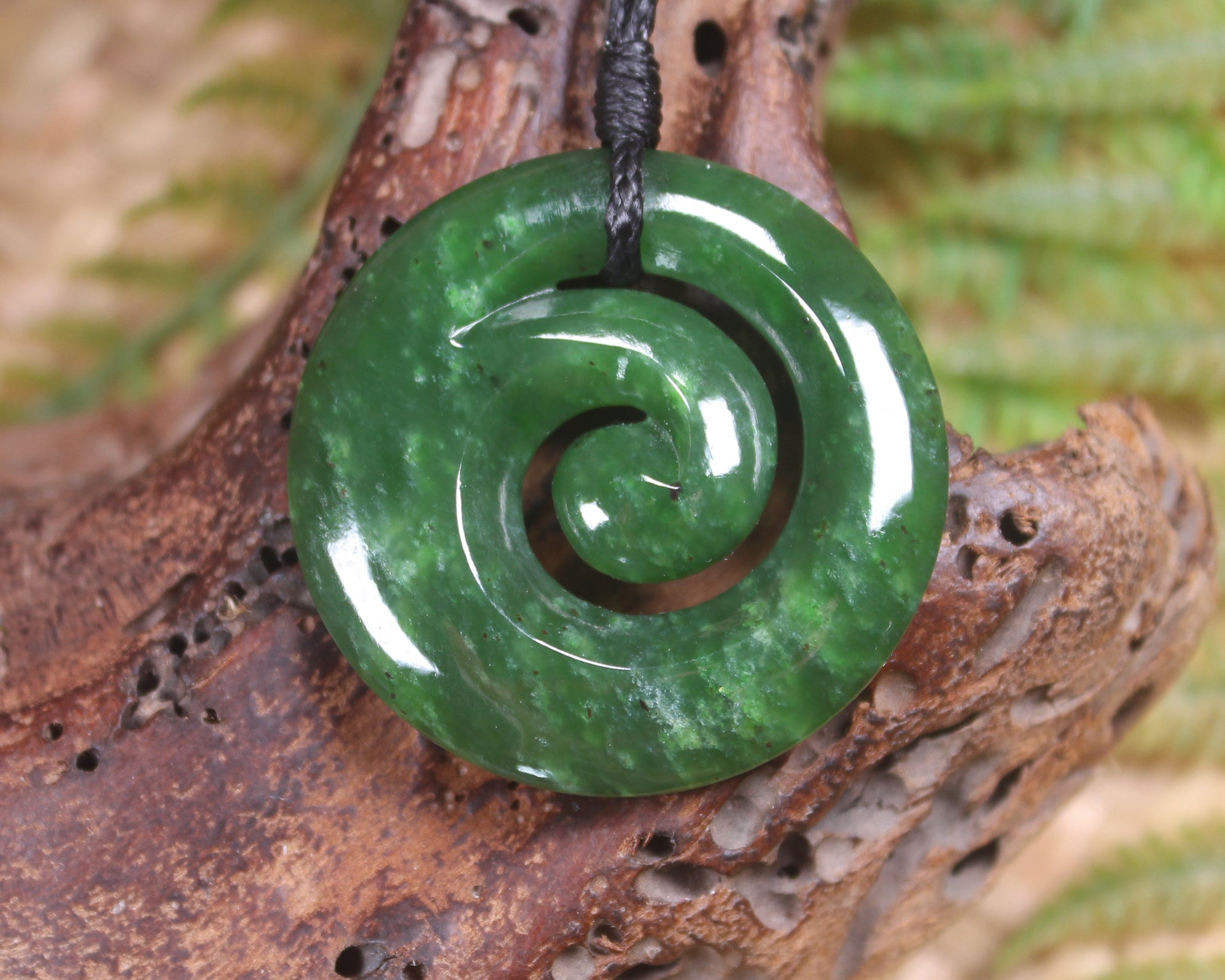 Koru pendant carved from Kawakawa Pounamu - NZ Greenstone