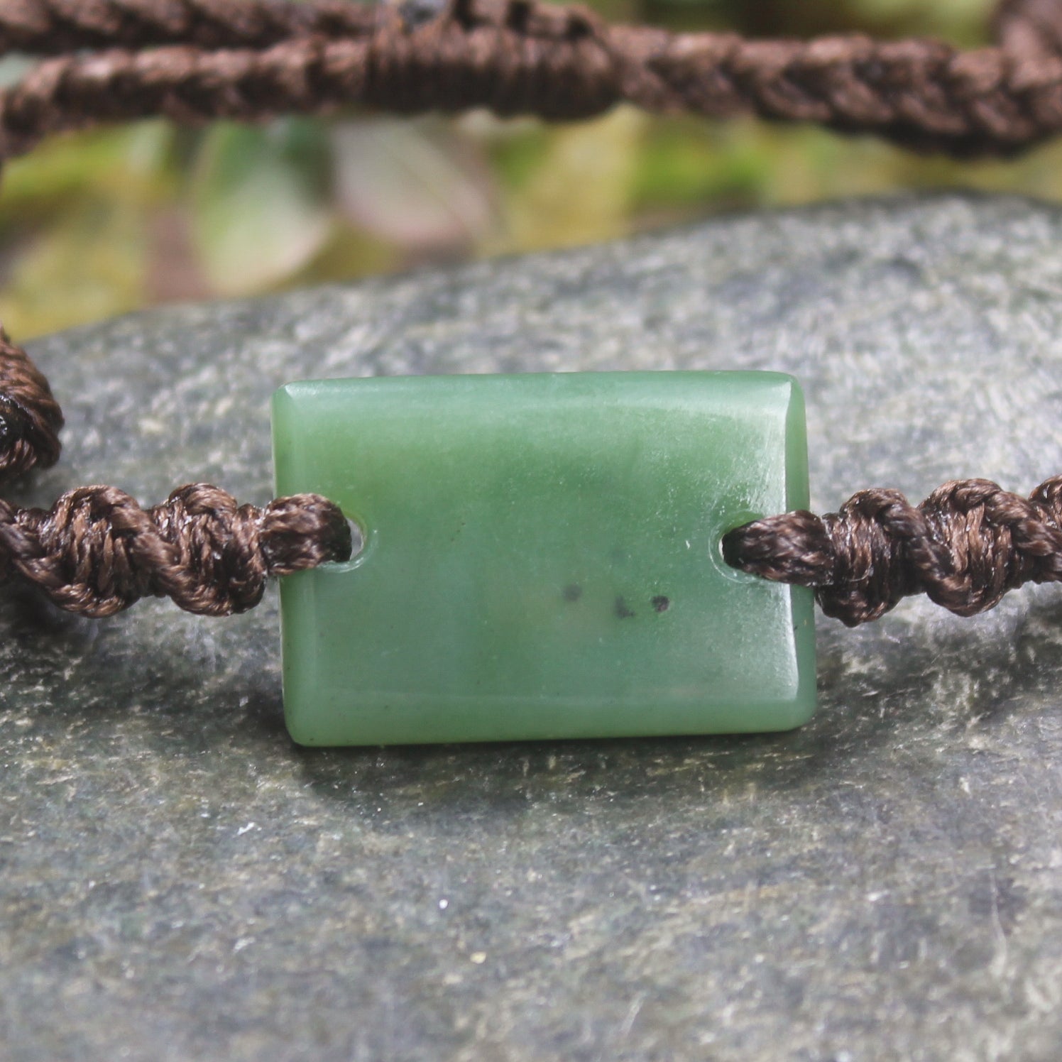 Adjustable cord bracelet with Hapopo Pounamu