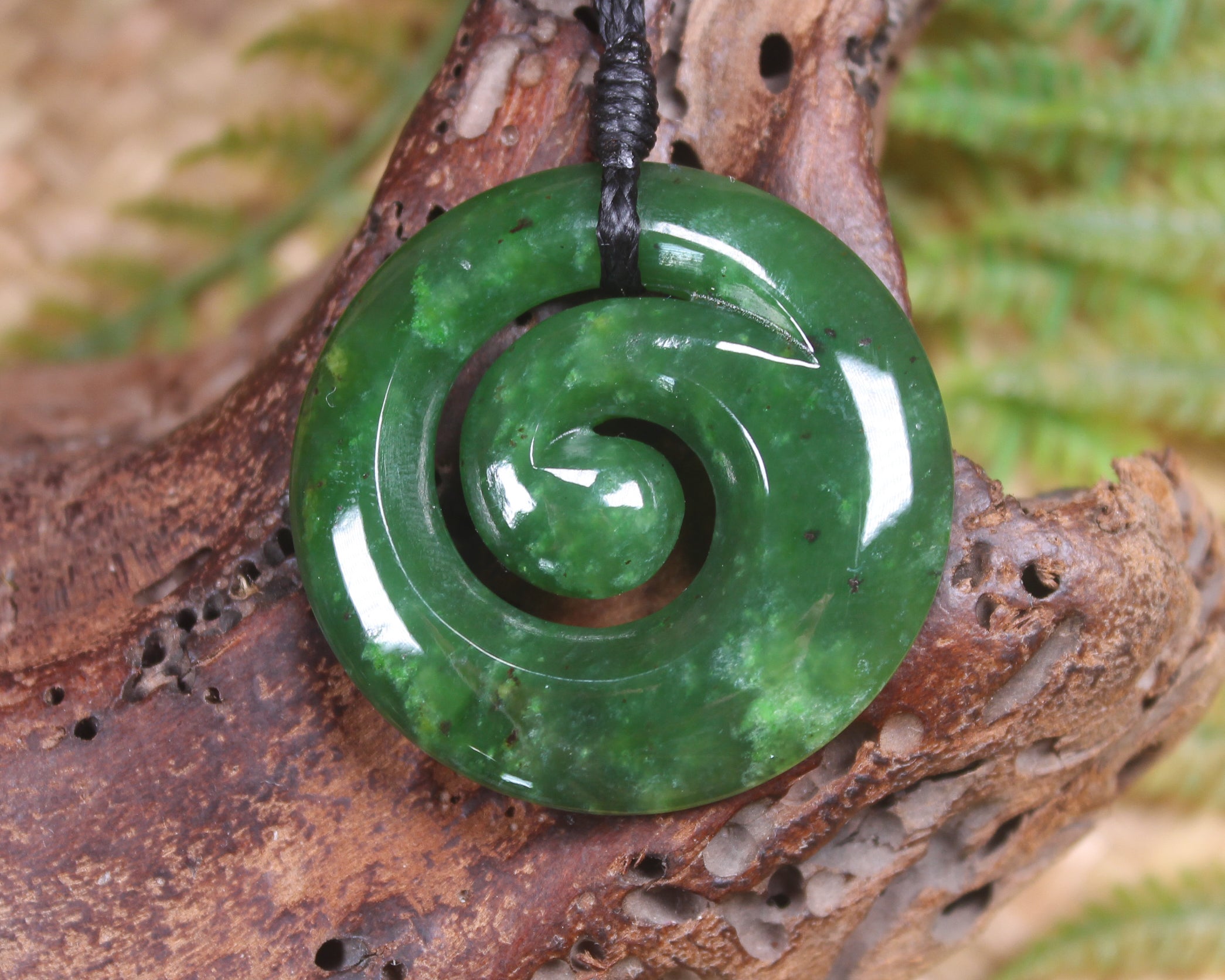 Koru pendant carved from Kawakawa Pounamu - NZ Greenstone