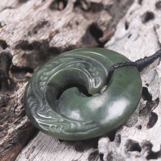 Koru carved from Rimu Pounamu - NZ Greenstone