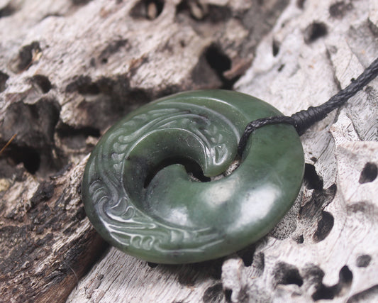 Koru carved from Rimu Pounamu - NZ Greenstone