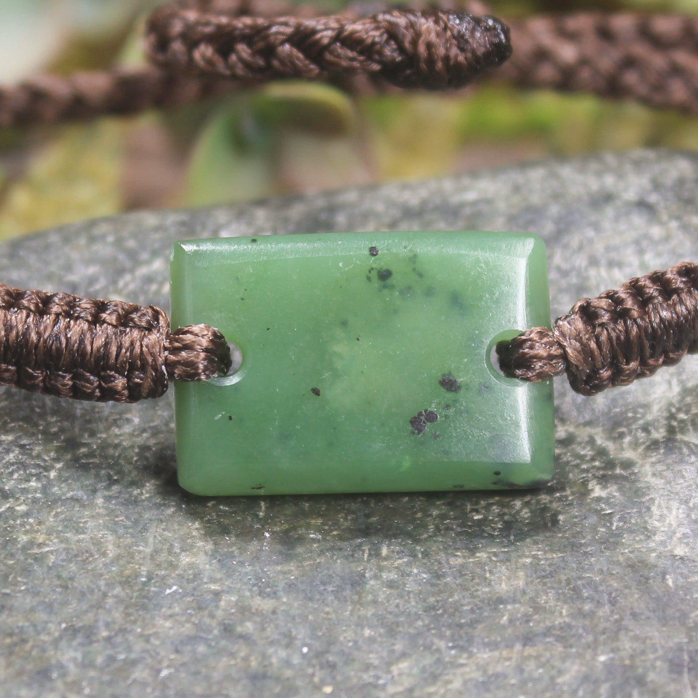 Adjustable cord bracelet with Hapopo Pounamu
