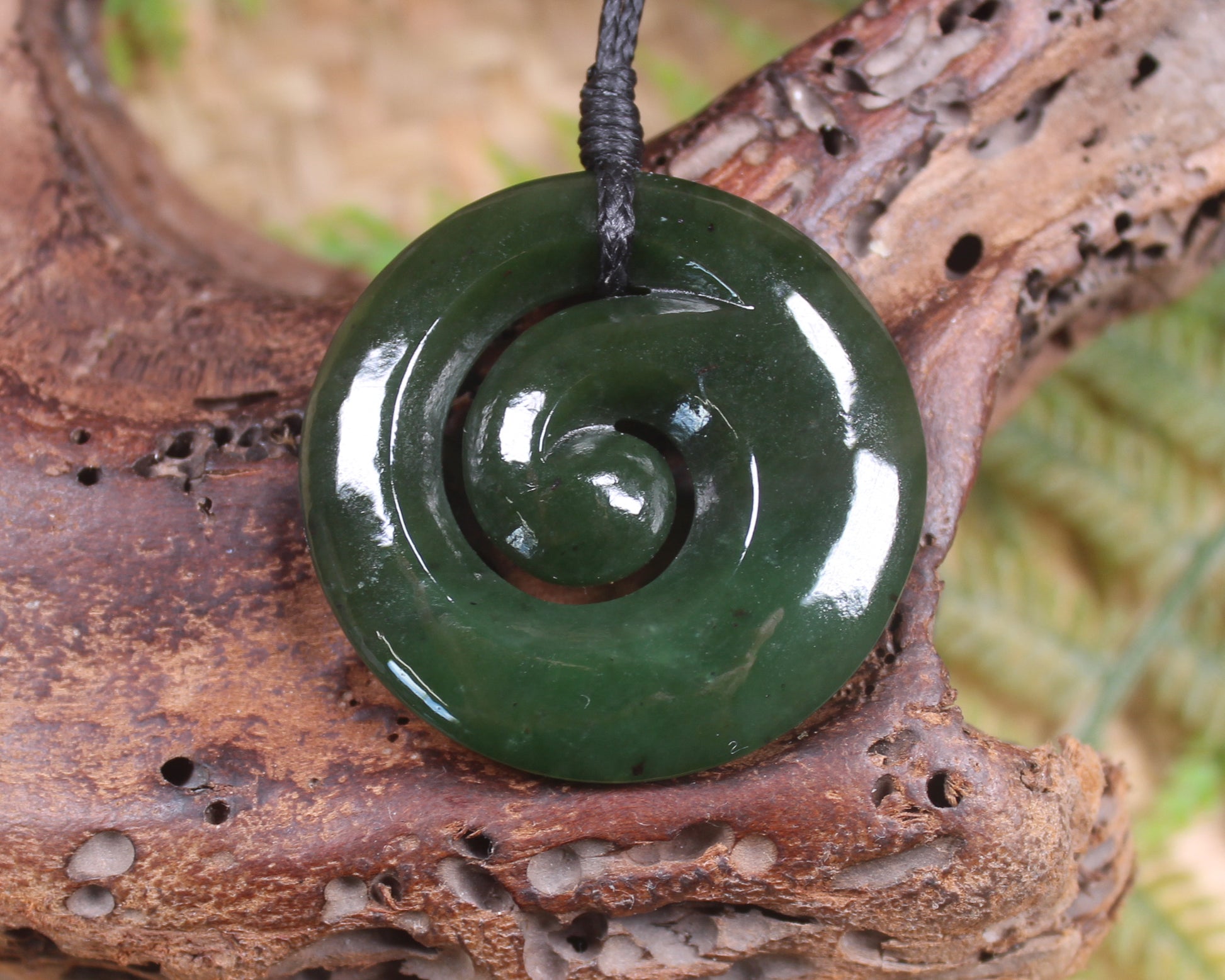 Koru pendant carved from Kawakawa Pounamu - NZ Greenstone