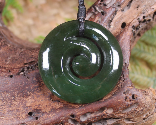 Koru pendant carved from Kawakawa Pounamu - NZ Greenstone