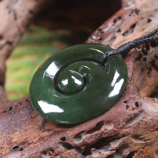 Koru pendant carved from Kawakawa Pounamu - NZ Greenstone