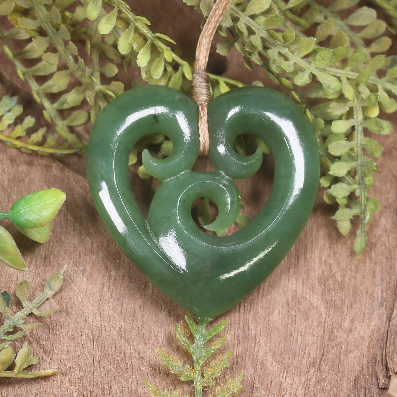 Heart with Koru carved from Hapopo Pounamu - NZ Greenstone