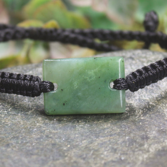 Adjustable cord bracelet with Hapopo Pounamu