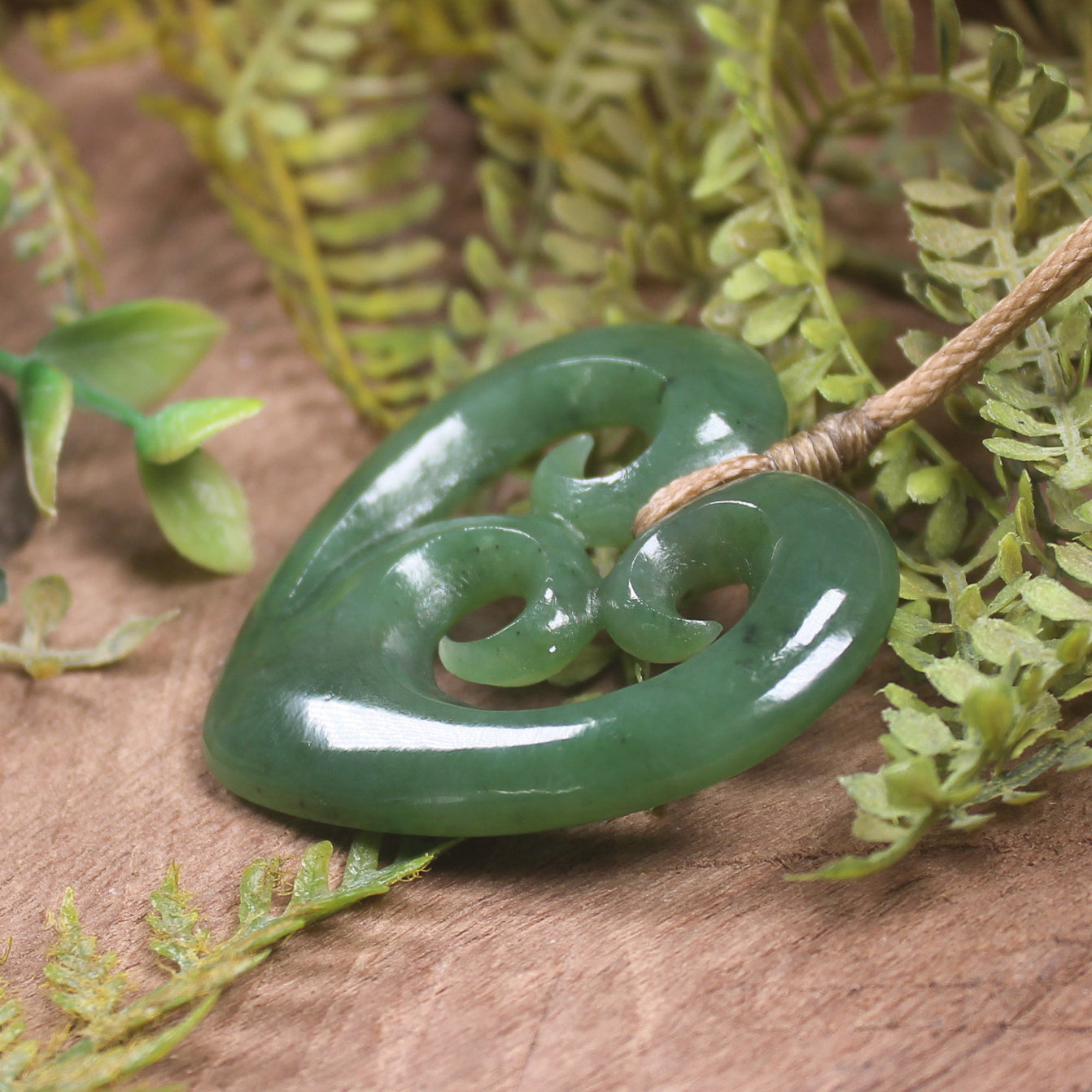 Heart with Koru carved from Hapopo Pounamu - NZ Greenstone