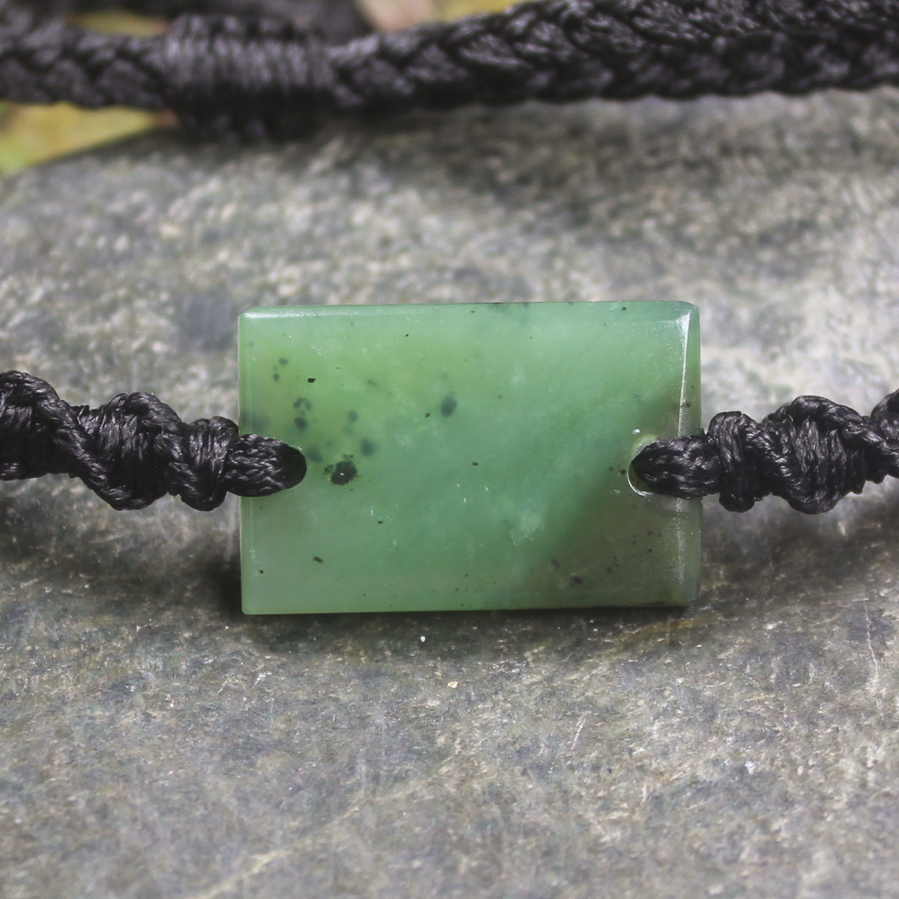 Adjustable cord bracelet with Hapopo Pounamu