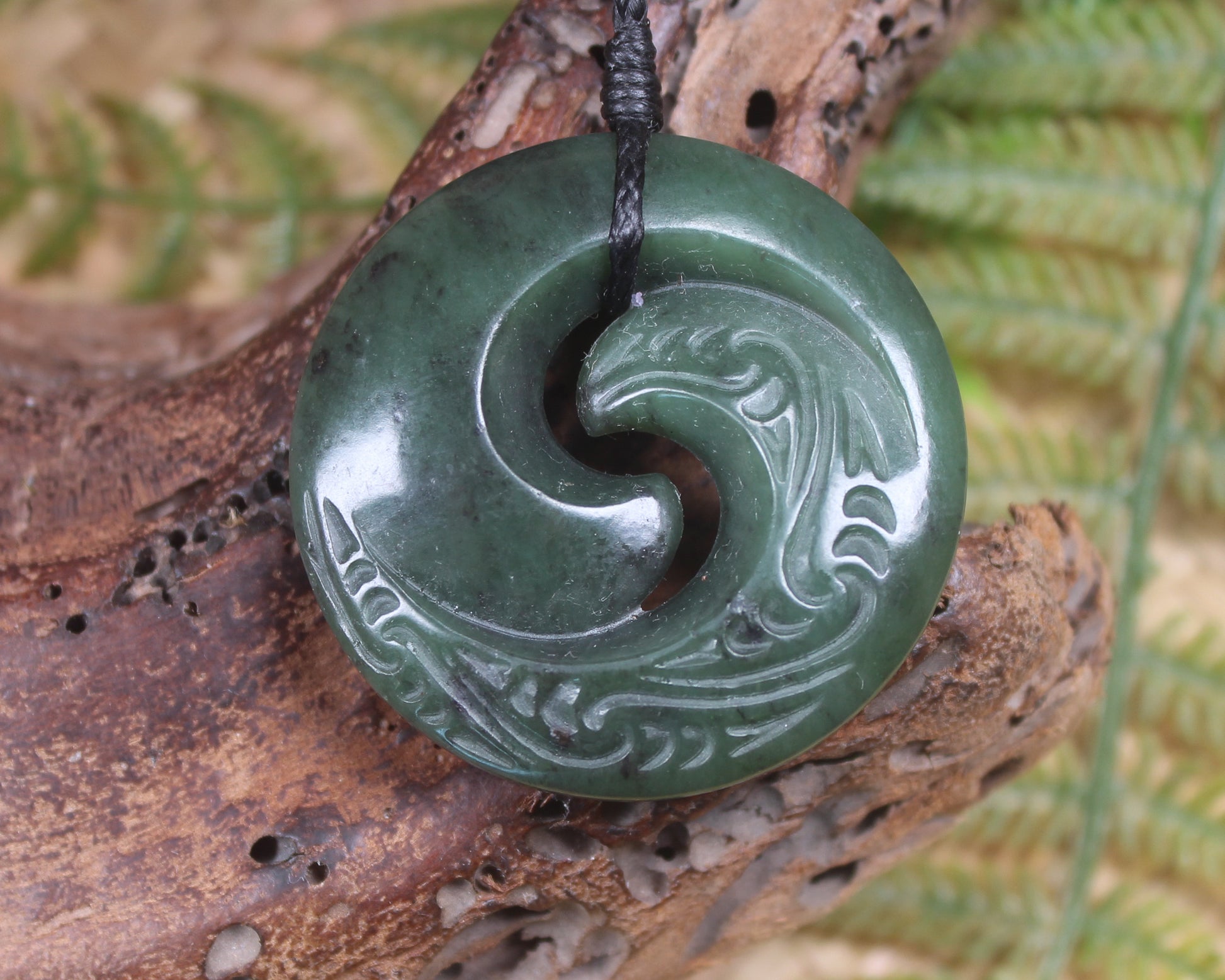 Koru pendant carved from Kawakawa Pounamu - NZ Greenstone
