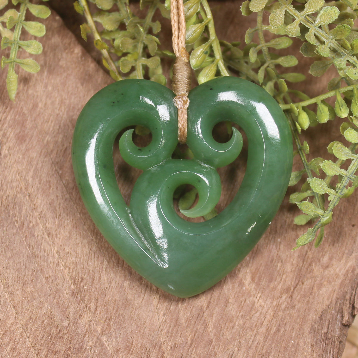 Heart with Koru carved from Hapopo Pounamu - NZ Greenstone