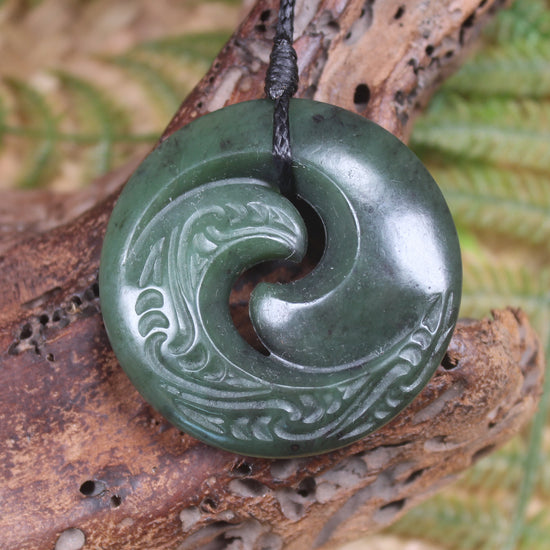Koru pendant carved from Kawakawa Pounamu - NZ Greenstone