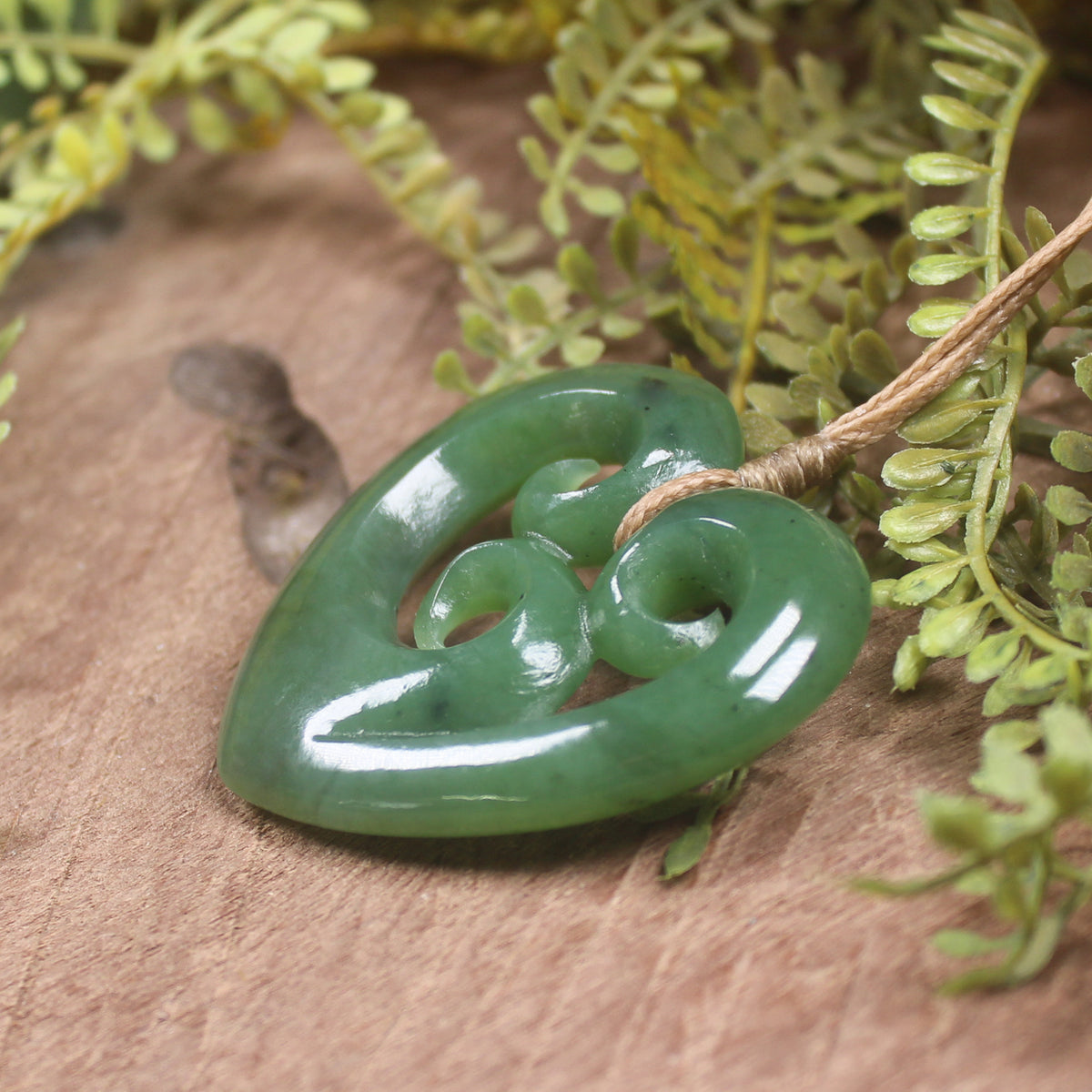 Heart with Koru carved from Hapopo Pounamu - NZ Greenstone