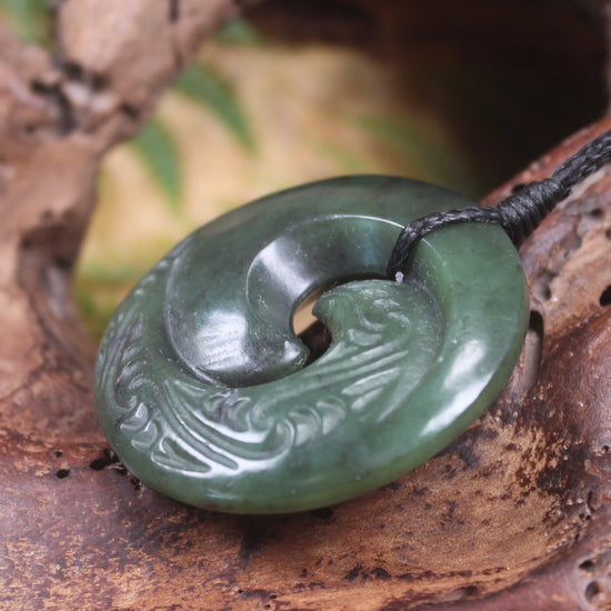 Koru pendant carved from Kawakawa Pounamu - NZ Greenstone