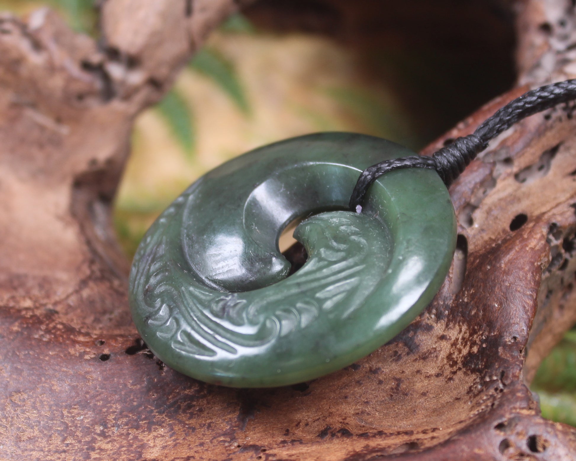 Koru pendant carved from Kawakawa Pounamu - NZ Greenstone