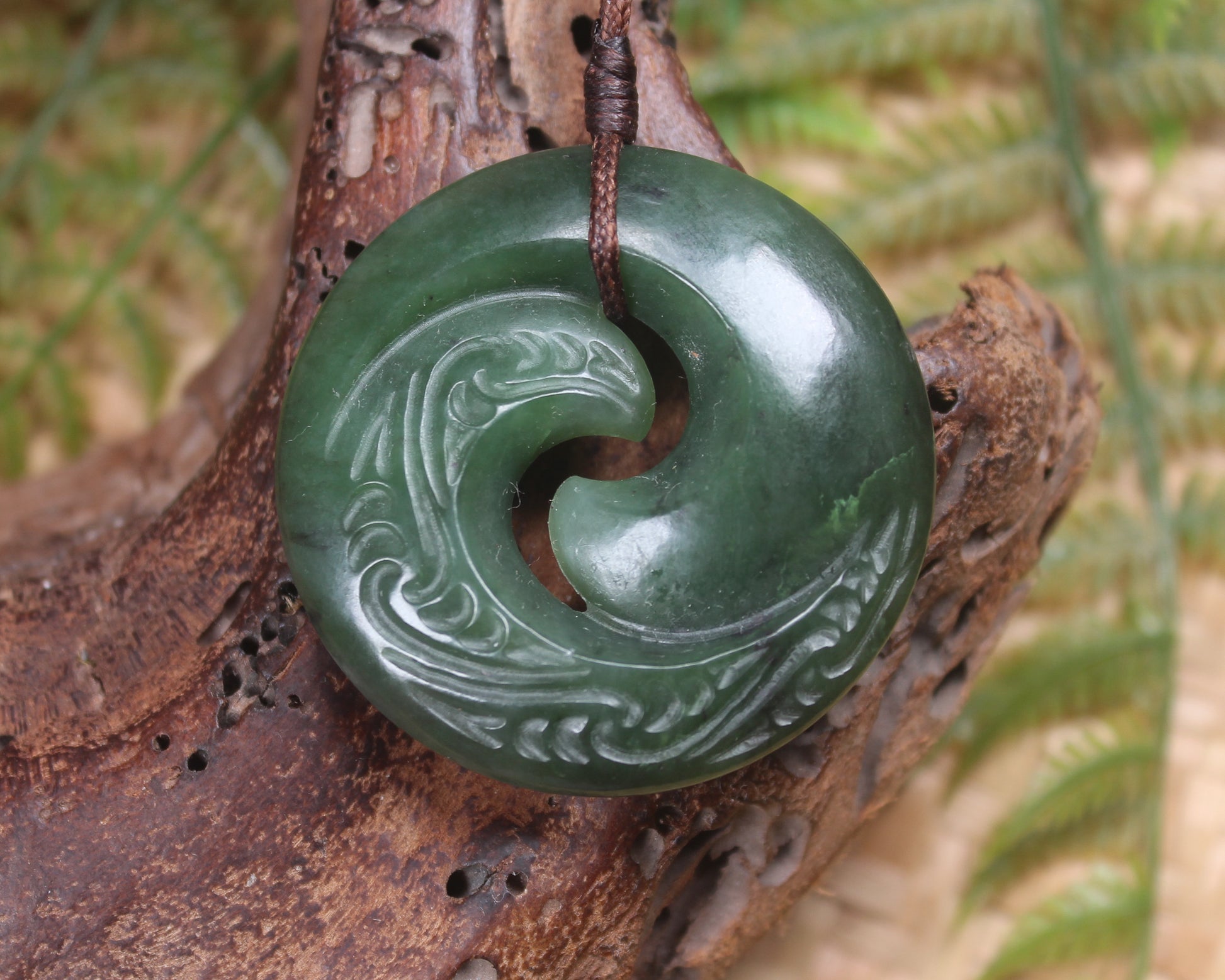 Koru pendant carved from Kawakawa Pounamu - NZ Greenstone