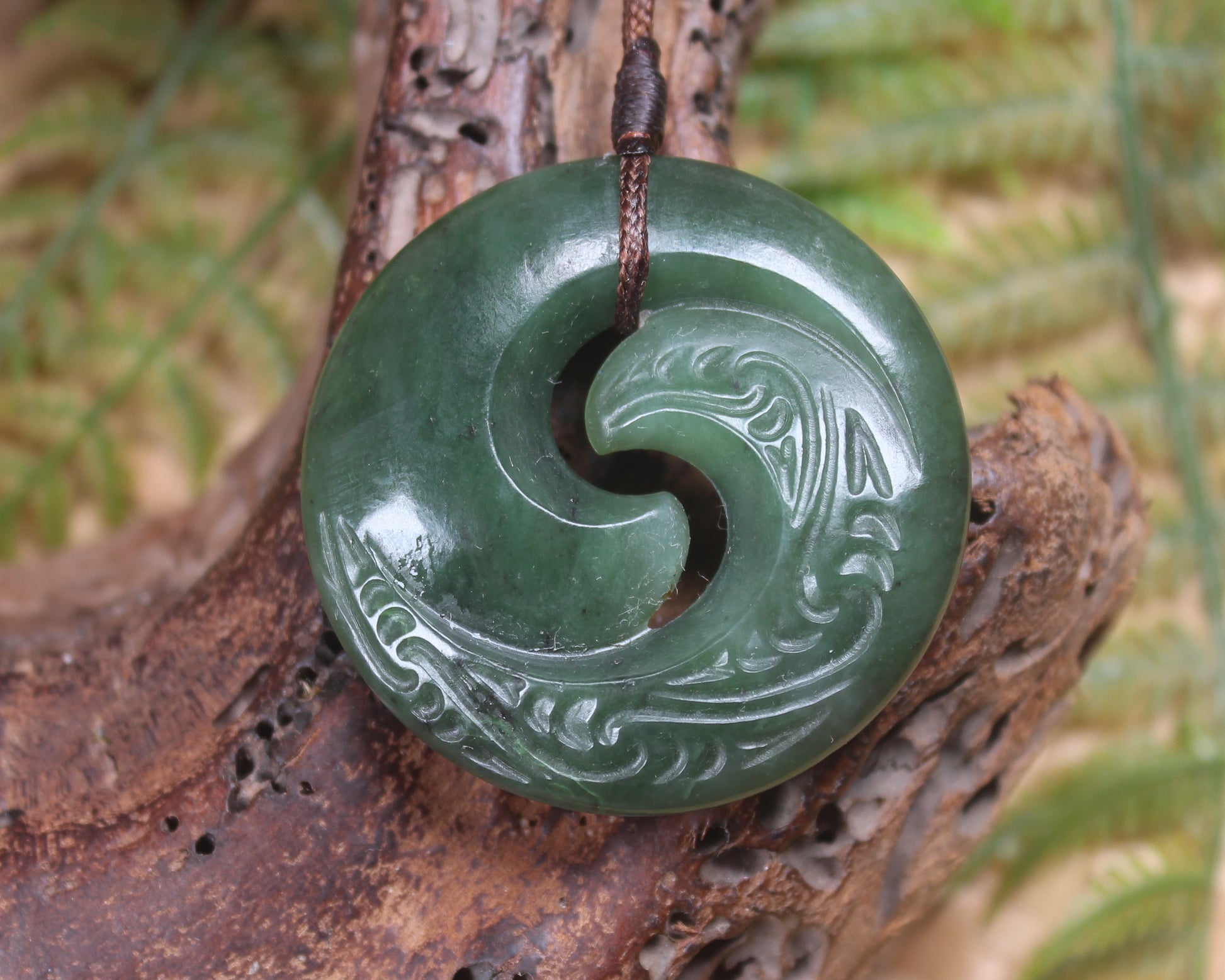 Koru pendant carved from Kawakawa Pounamu - NZ Greenstone