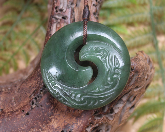 Koru pendant carved from Kawakawa Pounamu - NZ Greenstone