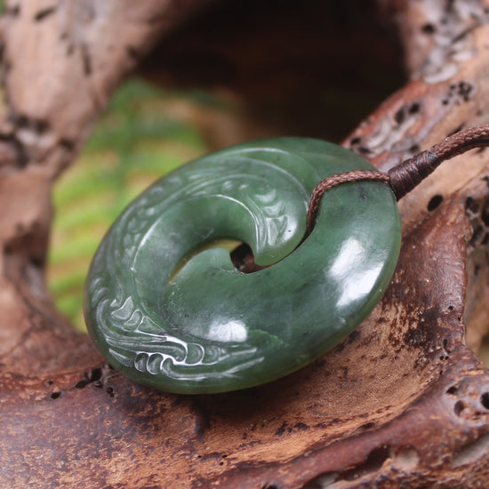 Koru pendant carved from Kawakawa Pounamu - NZ Greenstone
