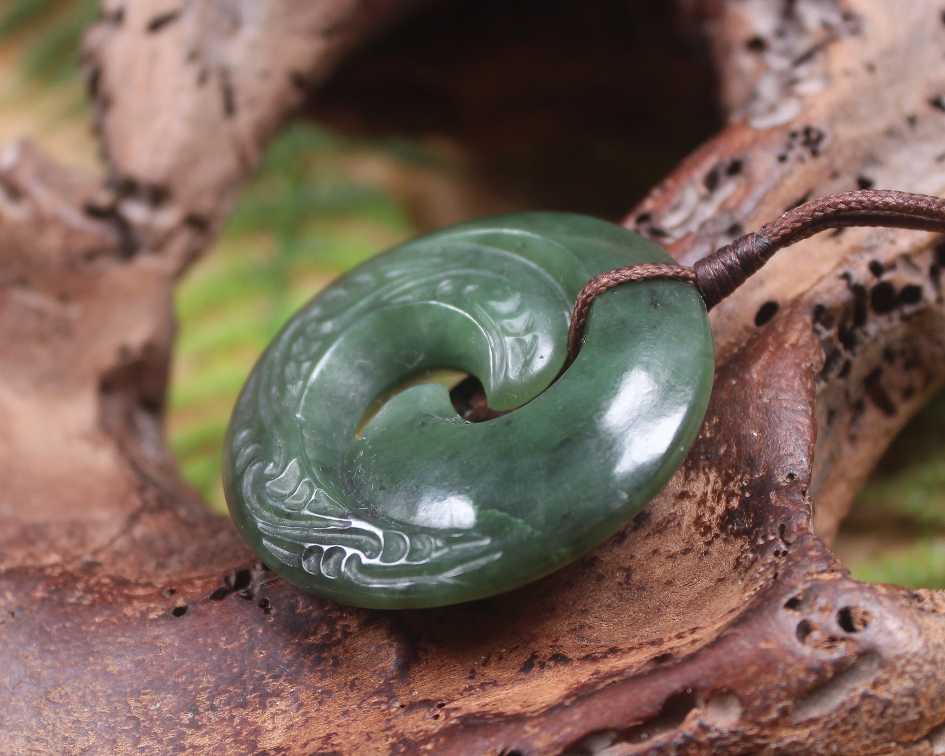 Koru pendant carved from Kawakawa Pounamu - NZ Greenstone