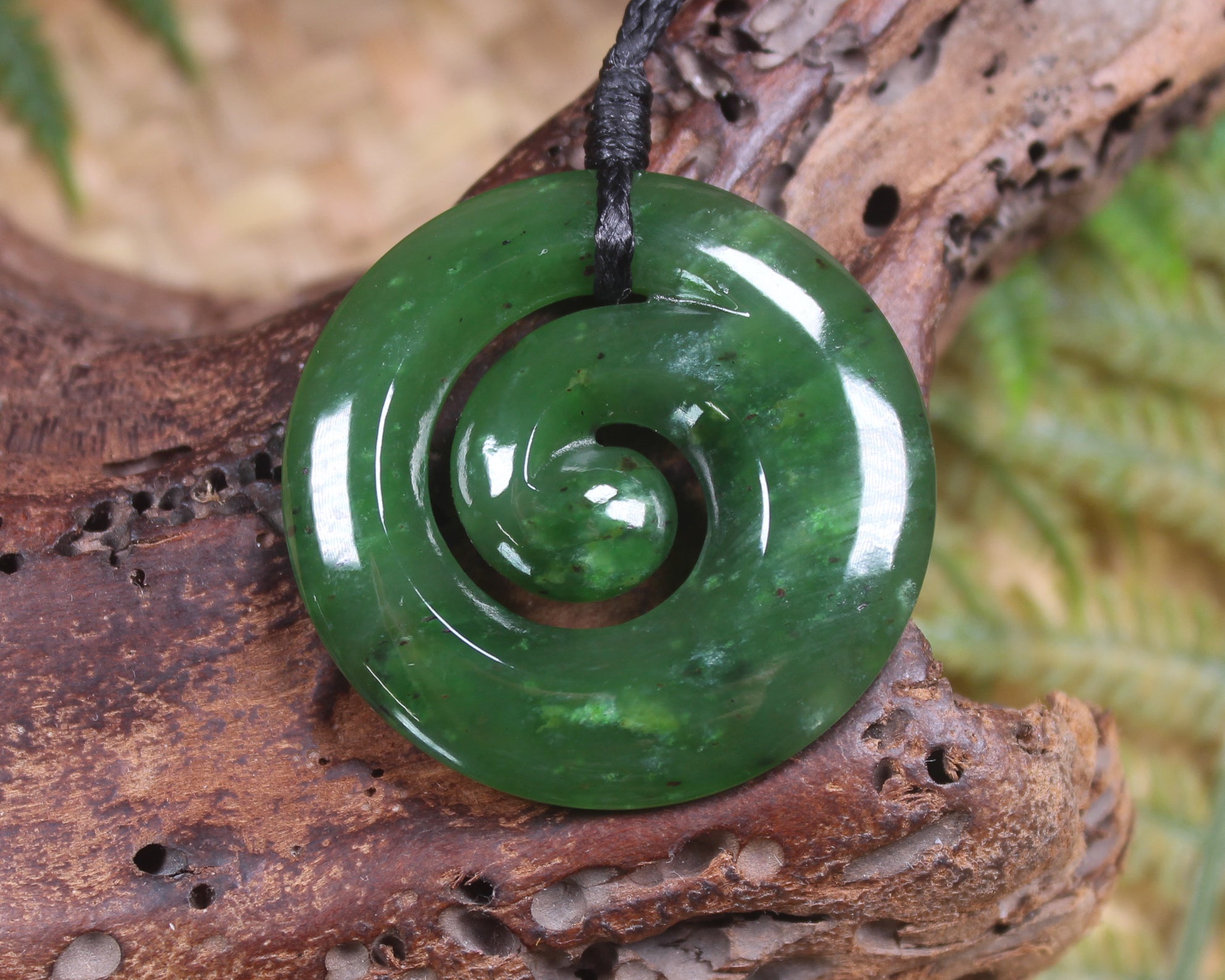 Koru pendant carved from Kawakawa Pounamu - NZ Greenstone