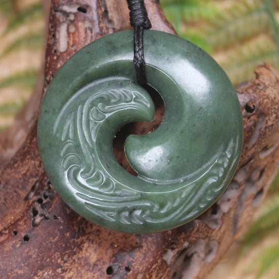 Koru pendant carved from Kawakawa Pounamu - NZ Greenstone