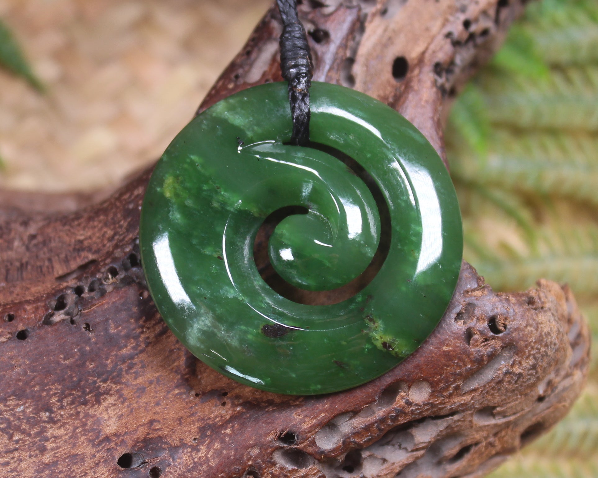 Koru pendant carved from Kawakawa Pounamu - NZ Greenstone