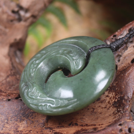 Koru pendant carved from Kawakawa Pounamu - NZ Greenstone