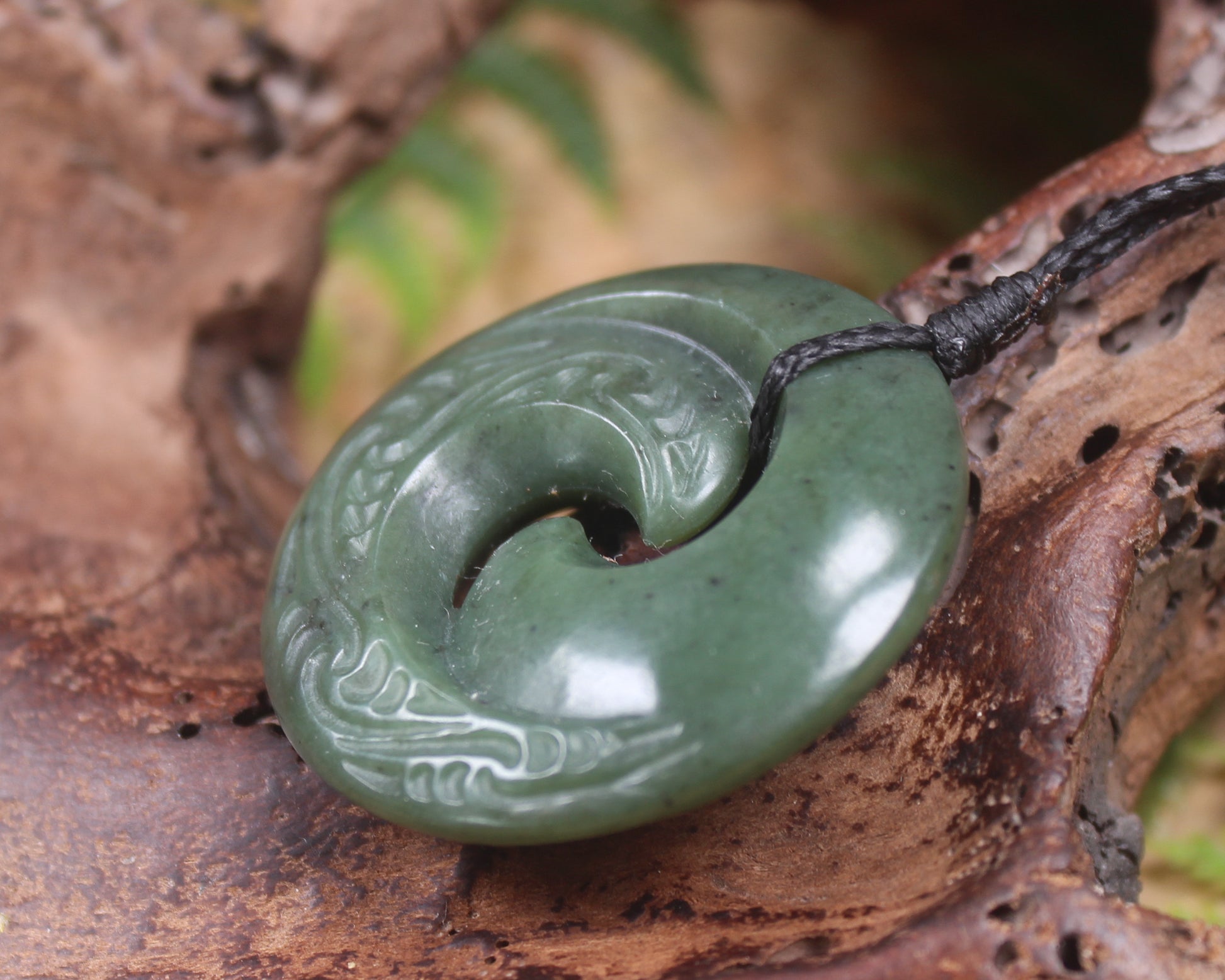 Koru pendant carved from Kawakawa Pounamu - NZ Greenstone
