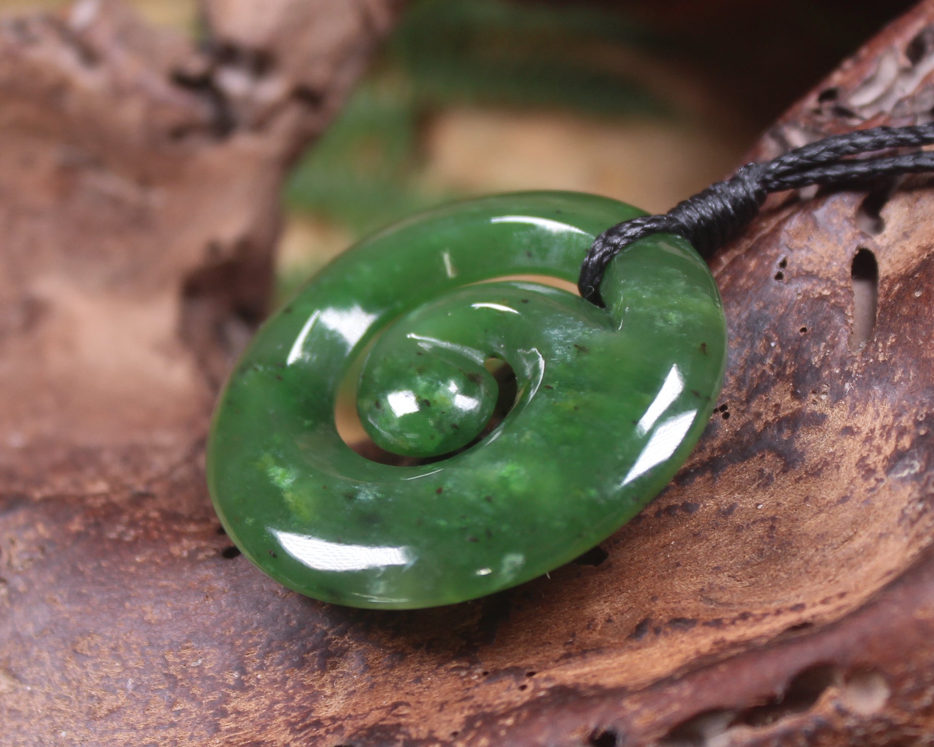 Koru pendant carved from Kawakawa Pounamu - NZ Greenstone