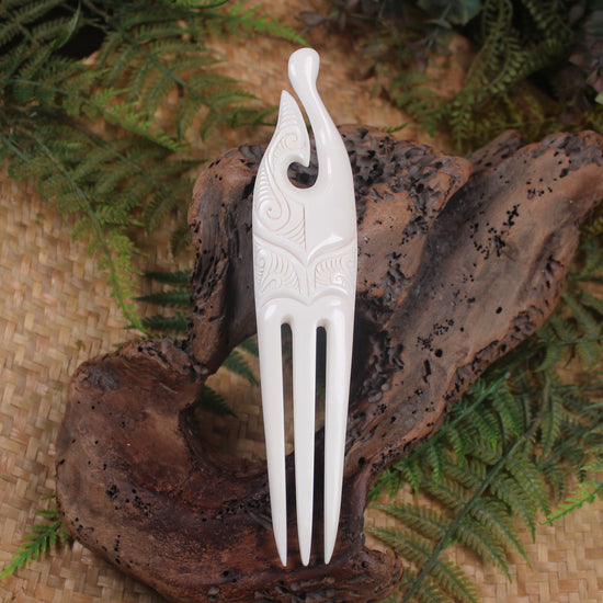 Heru with Matau carved from beef bone