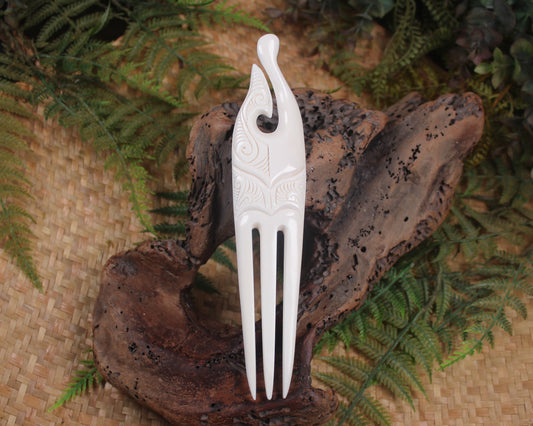 Heru with Matau carved from beef bone