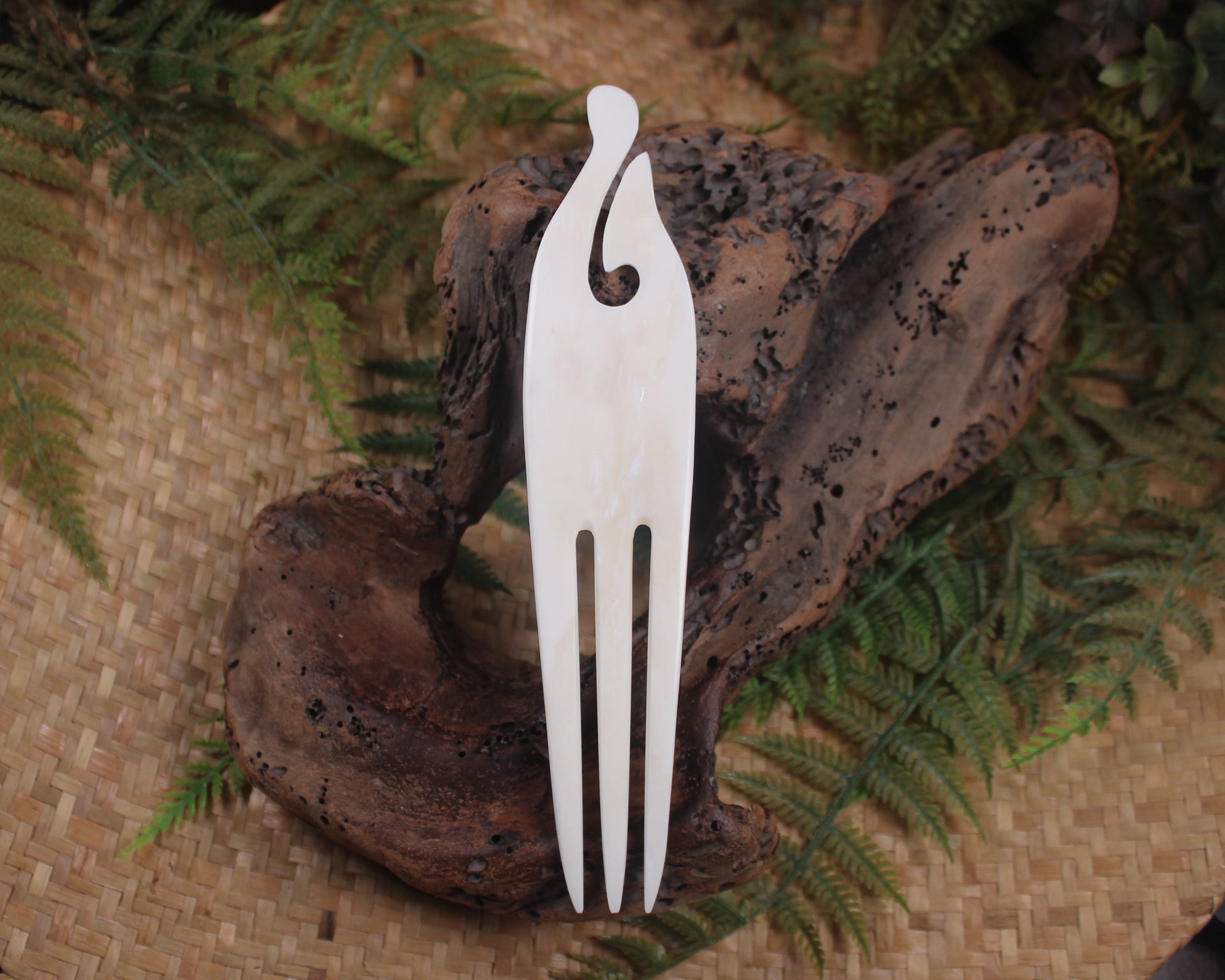 Heru with Matau carved from beef bone