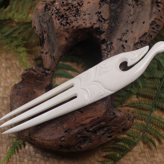Heru with Matau carved from beef bone