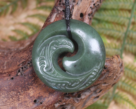 Koru pendant carved from Kawakawa Pounamu - NZ Greenstone