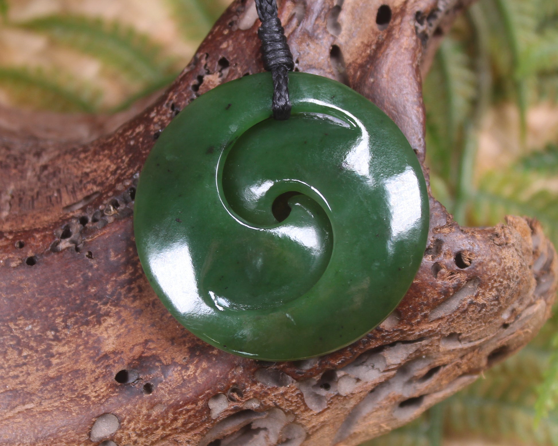 Koru pendant carved from Kawakawa Pounamu - NZ Greenstone